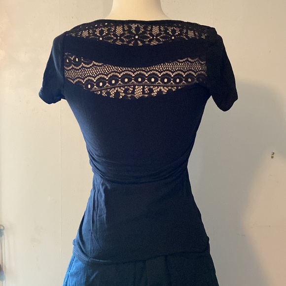 Black short sleeve tee with lace cut-out across chest and back. Like new - Picture 2 of 3